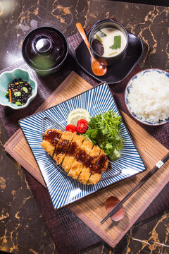 Delicious meal served on a table with various dishes including rice and soup