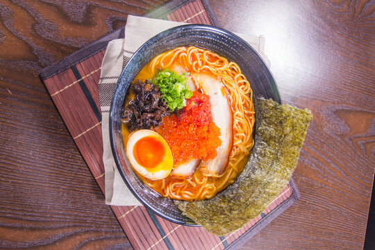 Delicious bowl of ramen served with toppings in a Japanese restaurant