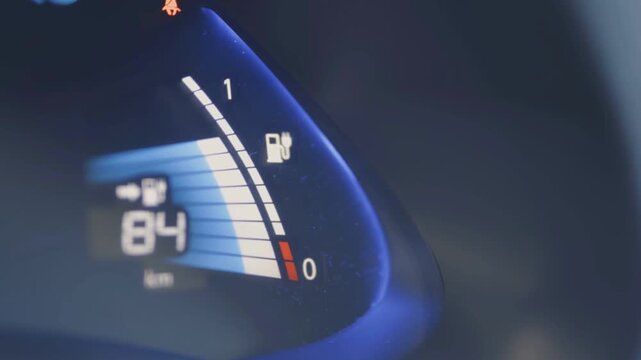 Close Up Electric Car Dashboard Showing Battery Gauge Charging To 84 Percent
