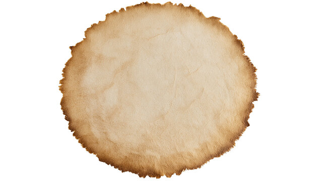 Round piece of aged parchment paper with burnt rough edges
