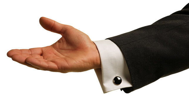 Open palm of a man in a black suit jacket with a white shirt and cufflink