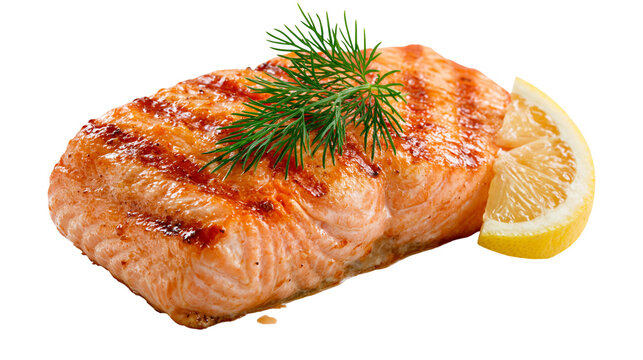 Grilled salmon fillet with charred grill marks topped with fresh dill and lemon