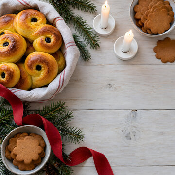 Swedish Saint Lucia Saffron Buns and Candles Flat Lay