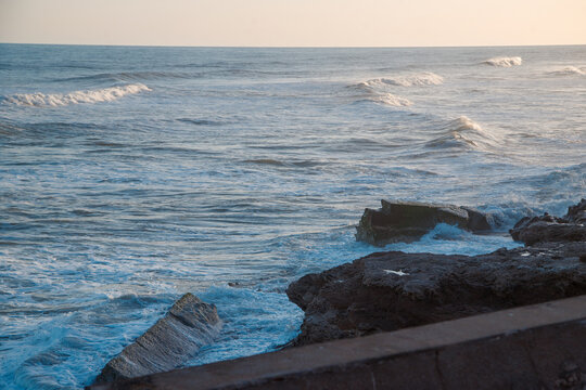 waves crashing on rocks