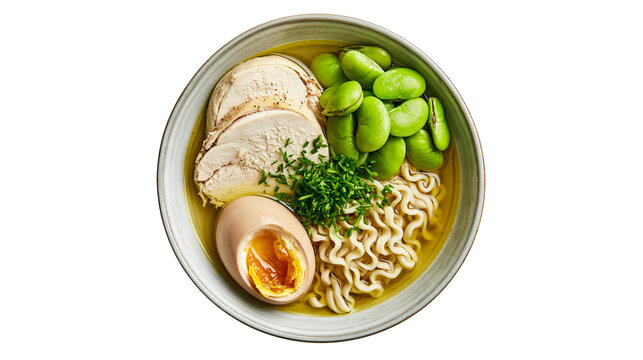 Ramen bowl with sliced chicken breast soft boiled egg, edamame and fresh herbs