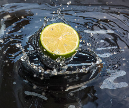 Fresh lime with water splash