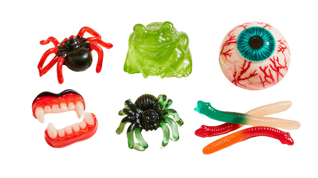 Assorted spooky Halloween gummy candies including spiders frog, eyeball and teeth