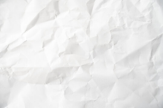 Grunge wrinkled white color paper textured background with copy space. Use for decoration or layer