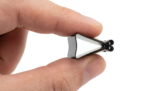 Human fingers squeezing a metal steel paper binder foldback clip open mockup isolated on transparent background.