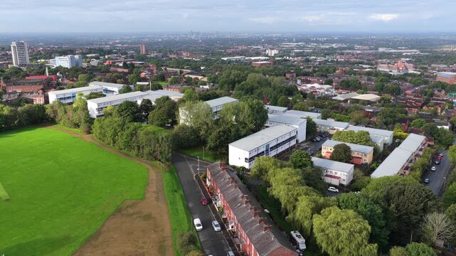 Aerial Video of Oldham Edge Residential Housing and Distant Manchester City Skyline