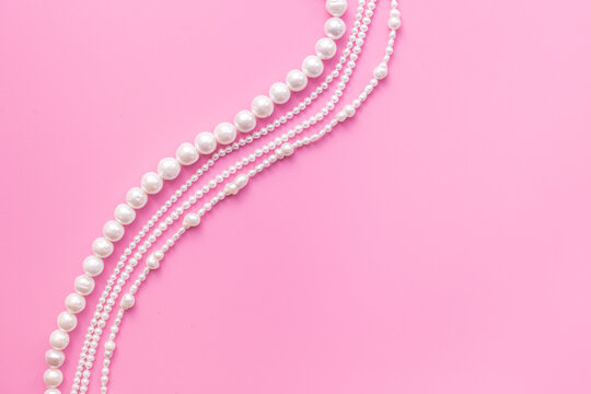 Natural white pearls - beads for jewelry, top view. Precious and elegance concept background