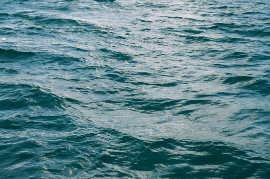 Turquoise Sea Water with Gentle Rolling Ocean Waves