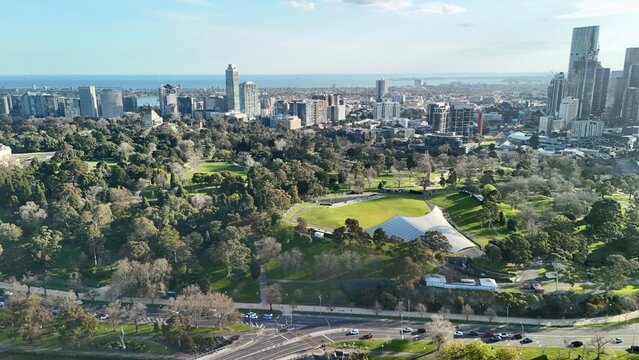 Royal Botanic Gardens Victoria, Melbourne, Australia &ndash; 4K aerial drone view of lush parklands, urban gardens, Sidney Myer Music Bowl, Southbank skyline, city CBD