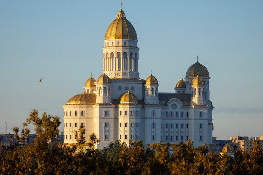 People&rsquo;s Salvation Cathedral illuminated by golden hour light in Bucharest, Romania