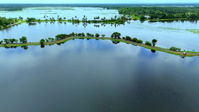 Iconic landscape of Veliyanad in Kerala&rsquo;s Kuttanad region flooded polder fields (padasekharams),Kuttanad&rsquo;s below-sea-level ecosystem, monsoon waterlogging,ural transport, backwater scenery