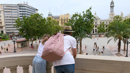 Tourists Admiring Bustling City Square View © Kos6ka