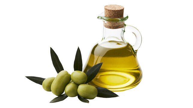 Glass carafe of golden olive oil with fresh green olives and leaves