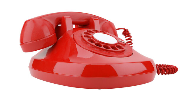 Bright red vintage rotary telephone with coiled cord and circular dial
