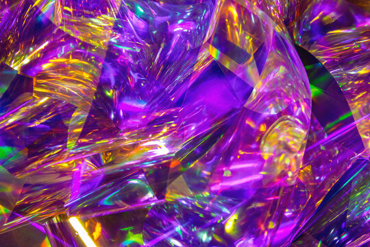 Abstract crumpled holographic foil background with a deep purple core and golden yellow prismatic edges. Lives in a Y2K Synthwave Album Cover Background, synthwave music and DJ event flyer design.
