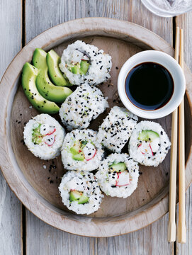 California roll with crab, avocado, cucumber and sesame seeds