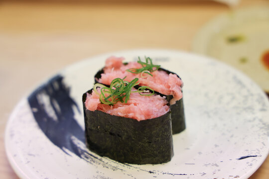 Japan April 29 2026 Tuna gunkan sushi topped with garnish