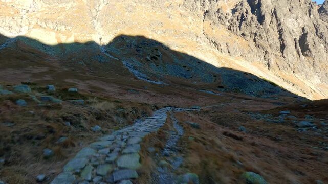 Action POV Hyperlapse Hiking Along Rocky Alpine Mountain Trail