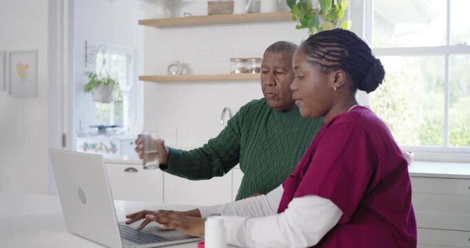 African nurse in scrubs offering pill, man drinking water, typing laptop explaining meds at counter