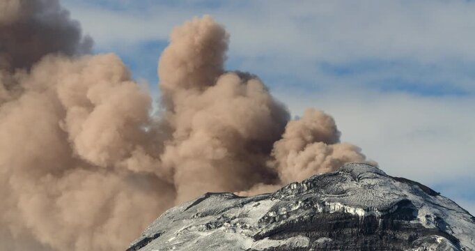 Cotopaxi Volcano, Ecuador, erupting, 12th of May 2023,. Volcanic ash is erupting from the crater. At 5897m altitude one of the world's highest active volcanoes.
