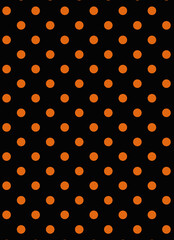 Orange Polka Dot Pattern on Black Background © Annie