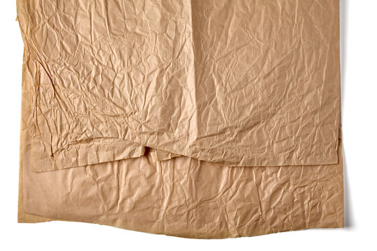 Crumpled Brown Kraft Wrapping Paper Texture on White