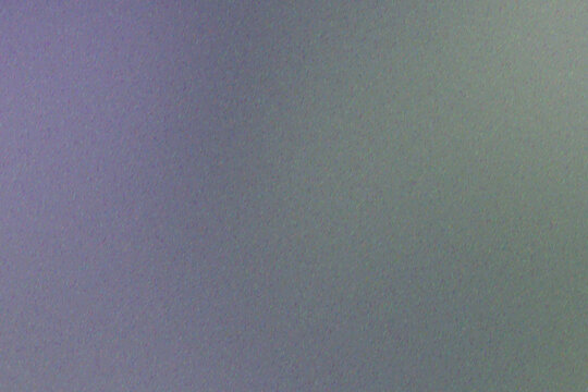 Abstract iris garden backdrop with a soft colorful gradient, blurred coarse-grain texture, granular surface, muted tones and subtle visual noise