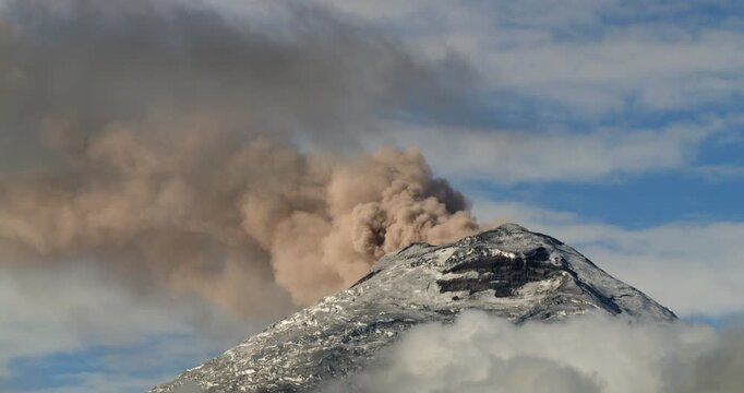 Cotopaxi Volcano, Ecuador, erupting, 12th of May 2023,. Time lapse. Volcanic ash is erupting from the crater. At 5897m altitude one of the world's highest active volcanoes.