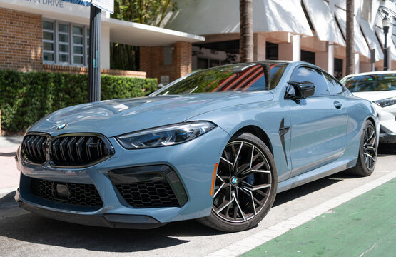 Miami, Florida, USA - May 09, 2025: BMW M8 2022 Competition Coupe car. Car BMW M8 convertible parked outdoor. Grey convertible car, top view