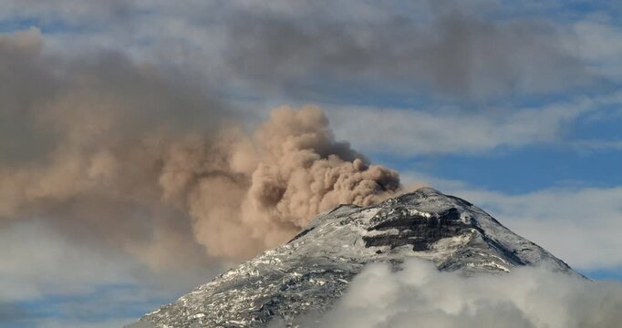 Cotopaxi Volcano, Ecuador, erupting, 12th of May 2023,. Volcanic ash is erupting from the crater. At 5897m altitude one of the world's highest active volcanoes.
