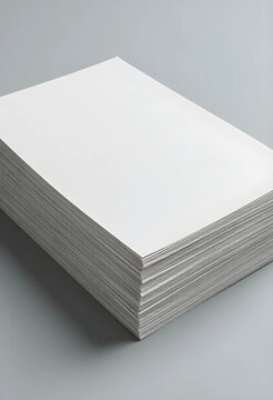 Productivity and office administration, stack of blank white paper sheets for printing or document design on a neutral gray background