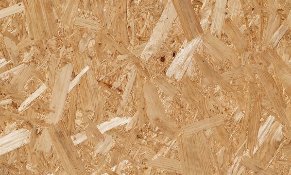 Oriented strand board wooden texture background with compressed flakes chip