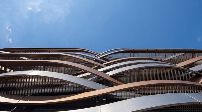 Modern Architectural Building Facade with Curved Metallic Ribbons