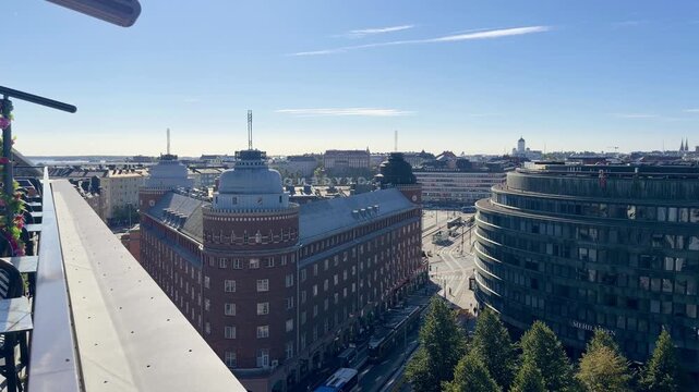 Helsinki skyline: Roof Ridge in Foreground With a Round Office Building Behind