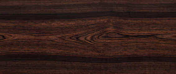 Exotic dark wood texture background showing rich ebony rosewood timber grain with striking banded cathedral pattern for design use © MDAzizur