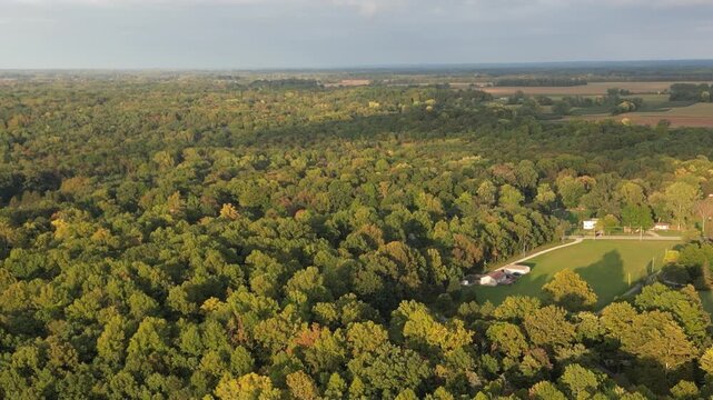 Aerial over Berrien Springs, in Berrien County, within the Oronoko Charter Township, Michigan, United States. Approaching Lake Chapin, a dammed lake along the St. Joseph's River.