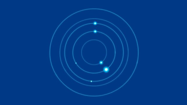 Glowing atom diagram with electron shells and bright particles on blue background