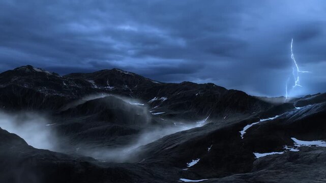 Dark Mountain Range Under Heavy Storm Clouds with Mist and Patches of Snow