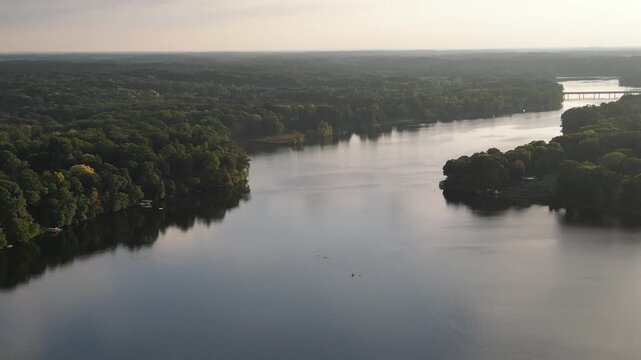 Aerial over Lake Chapin along the St. Joseph's River. Berrien Springs, Berrien County, Oronoko Charter Township, Michigan, United States. Rural community with farms and houses.
