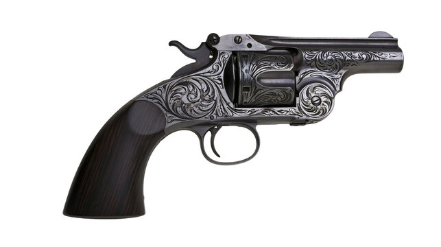 Antique engraved steel revolver with dark wooden grip handle