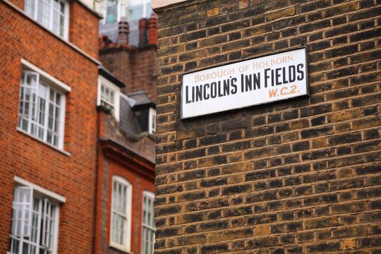 Lincoln's Inn Fields square name sign in the Borough of Holborn in London, UK.