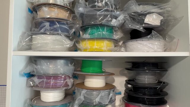 TPU, PLA, PETG, and ABS plastics; 3D printer filament spools; multicolored 3D filament; large stock of 3D printing plastic; monochrome and dual-color options, horizontal video