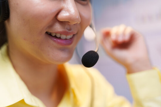 Smiling Customer Service Assistant Wearing Headset