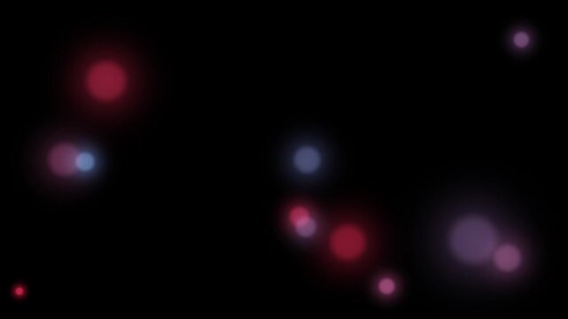 Red Blue Purple Bokeh Lights Drifting on Black Background