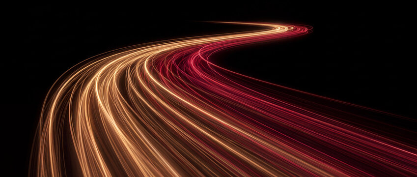 Light trails curving across black background with glowing orange and magenta fiber optic streaks forming an s-curve path for high-speed data transfer banners and modern technology wallpapers