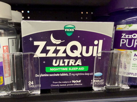 Frisco, Texas, USA - August 31th, 2026: doxylamine succinate nighttime medicine Vicks ZzzQuil Ultra sleep aid tablets purple box on Walmart pharmacy shelf